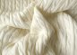 Preview: Winter dream knitted fabric in cable pattern ecru